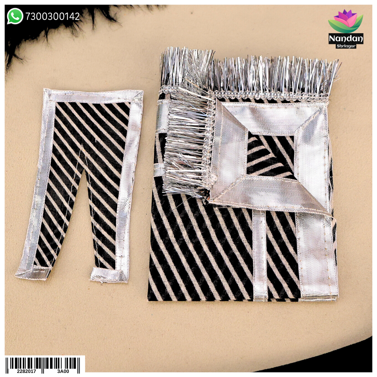 Black Lehariya Chira Odhni from Nandanshringars featuring traditional colorful patterns and lightweight fabric.