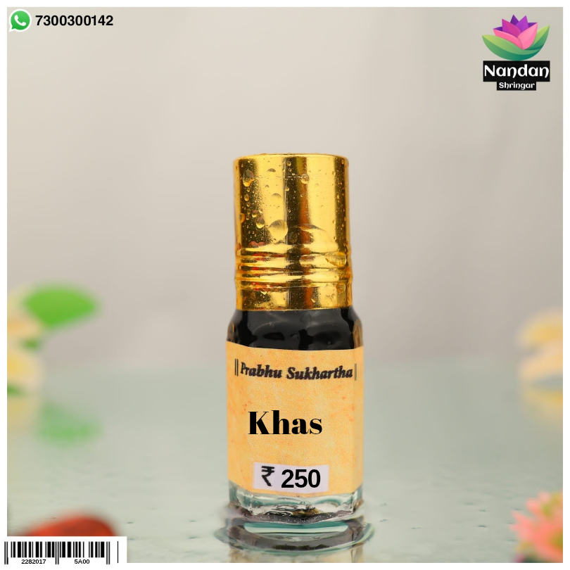 Nandanshringars Khas Itra bottle with traditional design, showcasing the fragrant herbal perfume in a clear glass container.