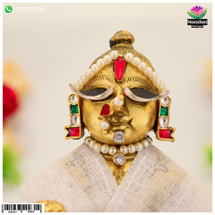 Makrakriti kundal earrings by Nandan Shringar featuring traditional kundan design with intricate craftsmanship.