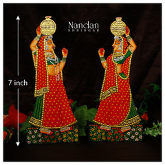 Orange Gopi Matki pair by nandanshringars, featuring traditional design and intricate detailing.