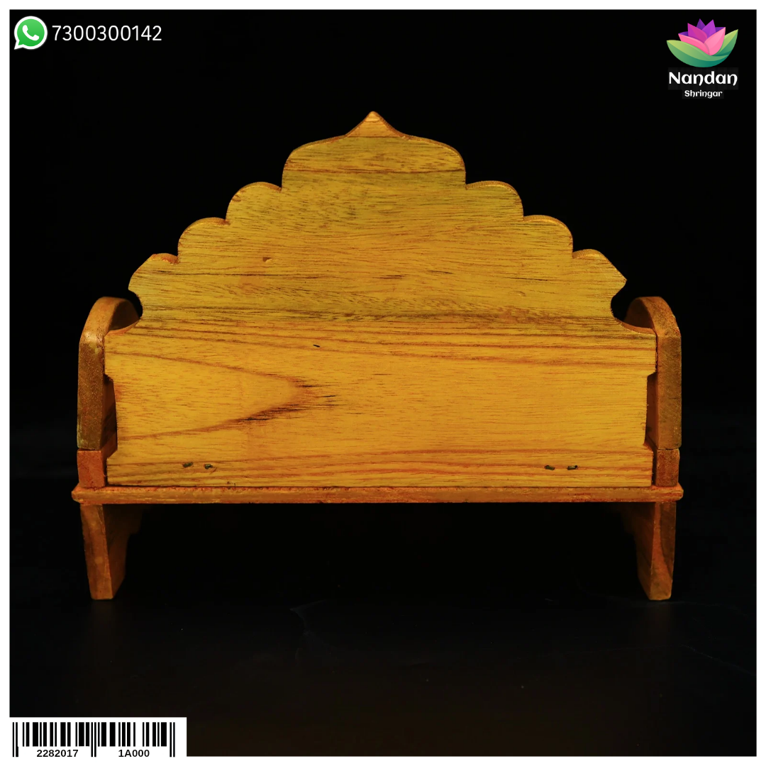 Folding wooden Sinhasan throne in natural finish, 10-inch size by Nandanshringars, with intricate carved details.