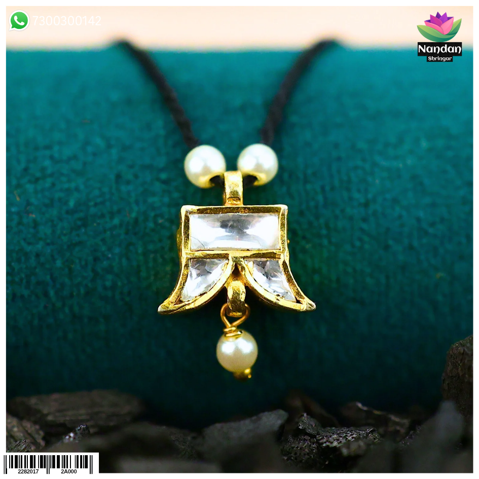 Nandanshringars Jadaau Waghnakh with real pearl (Heera) featuring intricate gold design and traditional Indian jewelry craftsmanship.