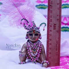 Nandan Shringar Kamal Kali Shringar jewelry with intricate gold and gemstone detailing, traditional Indian accessories for festive occasions.