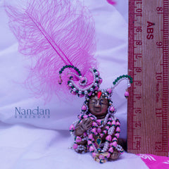 Nandan Shringar Kamal Kali Shringar jewelry with intricate design, featuring traditional gold-toned adornments.