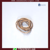 Nandanshringars Tulsi Kanthi necklace set, featuring 20 pieces of traditional prayer beads in natural hues and textures.