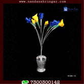 Fine silver flower pot by Utsav Arts, showcasing an elegant design with intricate detailing and a polished finish.