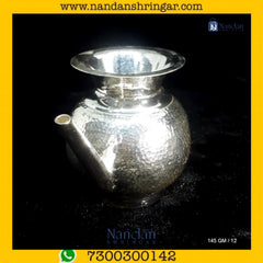 Fine silver jewelry by Utsav Arts, featuring intricate designs and elegant craftsmanship in a detailed display.