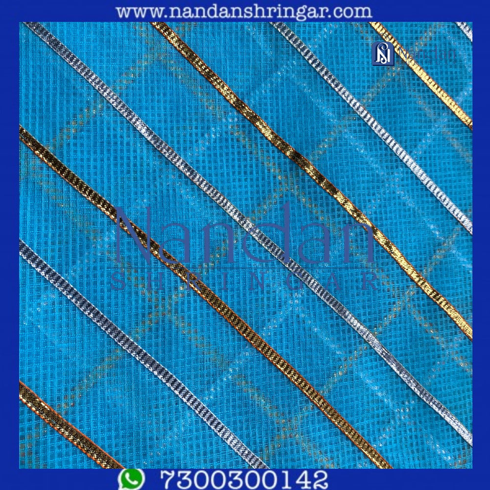 Blue Firozi Dhora Wala Doriya Special Zari Vastra by Nandanshringars, showcasing intricate zari detailing and vibrant color.