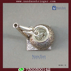 Fine silver carving Bilona set by Utsav Arts featuring intricate designs and elegant craftsmanship.