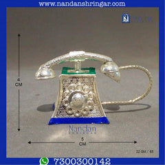 Fine silver telephone by Utsav Arts, showcasing intricate design and craftsmanship in elegant silver finish.