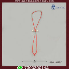 Fine silver Paphiya by Utsav Arts, showcasing intricate design and craftsmanship in a close-up view.