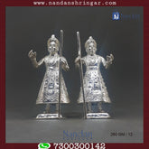 Pair of Dwarpal Fine Silver decorative figures by Utsav Arts, showcasing intricate detailing and craftsmanship.
