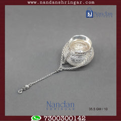 Fine silver Hanging Handi by Utsav Arts, featuring intricate designs and a traditional decorative style.