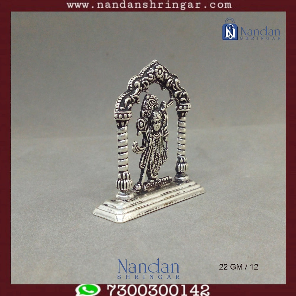 Fine silver Shreenath Ji figurine with intricate Rajbhog detailing by Utsav Arts, showcasing vibrant colors and craftsmanship.
