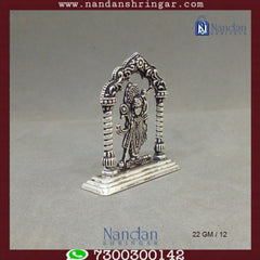 Fine silver Shreenath Ji figurine with intricate Rajbhog detailing by Utsav Arts, showcasing vibrant colors and craftsmanship.