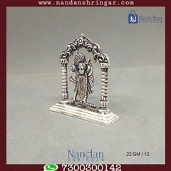 Fine silver Shreenath Ji idol with Rajbhog attire from Utsav Arts, showcasing intricate details and craftsmanship.