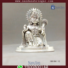 Fine silver statue of Hanuman Ji by Utsav Arts, showcasing intricate details and craftsmanship in a serene pose.