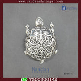 Fine silver tortoise figurine by Utsav Arts, detailed craftsmanship and smooth finish in a natural pose.