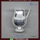 Fine silver jewelry from Utsav Arts featuring intricate design and craftsmanship, showcased in a beautifully lit image.