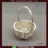 Fine silver basket by Utsav Arts, showcasing intricate design and craftsmanship, perfect for decorative use.