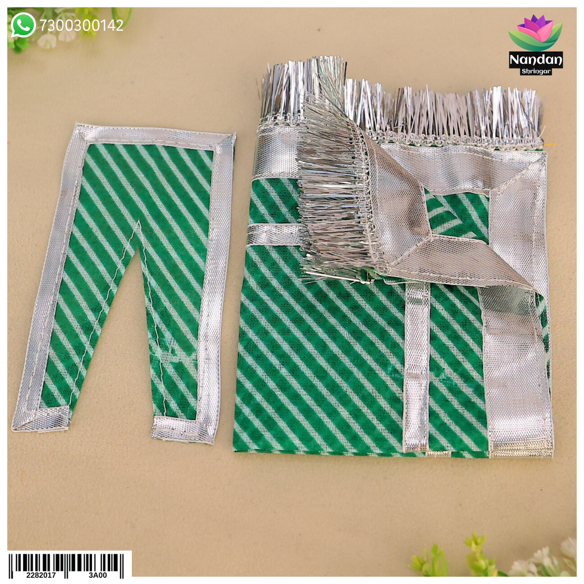 Green Lehariya Chira Odhni from Nandanshringars, featuring traditional Indian textile with intricate patterns and vibrant colors.
