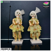 Pair of 6-inch cloth gop sets from Nandanshringars, featuring traditional Indian attire with vibrant colors and detailed embroidery.