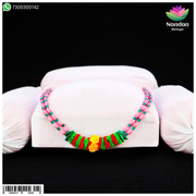 Nandanshringars Fool Mala cloth necklace, 12-inch full length with colorful beads and intricate design, displayed hanging.