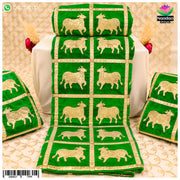 Green cow print velvet vastra with box pattern, showcasing soft fabric and detailed design from Nandan Shringar.