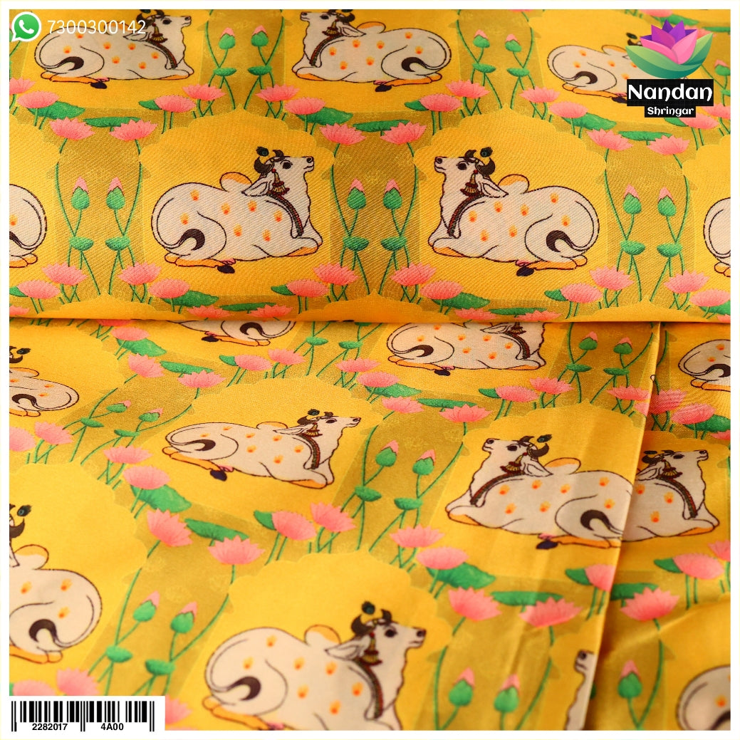 Yellow cow print vastra by Nandan Shringar, featuring traditional fabric with bold cow pattern and vibrant colors.
