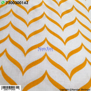 Nandanshringars Lehariya Vastra in Badami fabric, showcasing vibrant traditional Indian tie-dye with intricate patterns.
