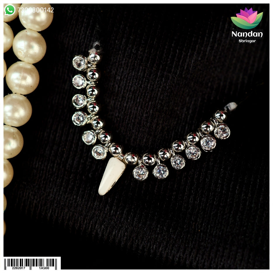 Nandanshringars Sharad Purnima special Ruperi Alkavali with intricate silver design and traditional craftsmanship.