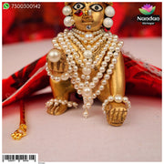 Nandanshringars Moti Sirpech Ko Shringar jewelry with intricate design, featuring precious stones and traditional craftsmanship.