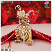Nandanshringars Moti Sirpech Ko Shringar jewelry with intricate design and sparkling stones.