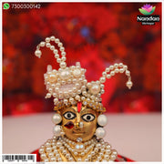 Nandanshringars Moti Sirpech Ko Shringar jewelry with intricate design, featuring traditional gemstone adornment for festive occasions.