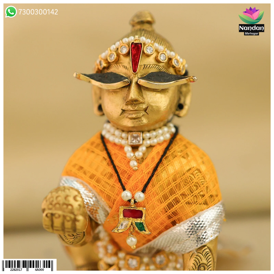 Nandanshringars Jadaau Waghnakh with real pearls, traditional Indian jewelry, detailed gold design and pearl embellishments
