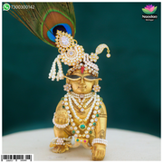 Nandanshringars Waghnakh Haar with Heera Panna, traditional Indian jewelry featuring intricate gold and gemstone detailing.