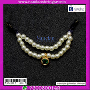 Blue border Kantheshwari jewelry piece by Nandanshringars featuring intricate traditional design and vibrant blue accents.