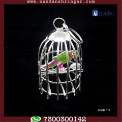 Fine silver parrot sculpture by Utsav Arts, showcasing intricate detailing and craftsmanship.