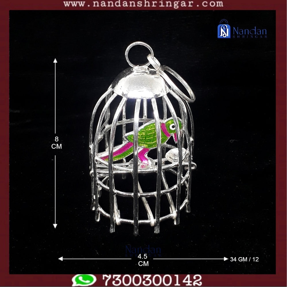 Fine silver parrot sculpture by Utsav Arts, showcasing intricate detailing and vibrant craftsmanship.