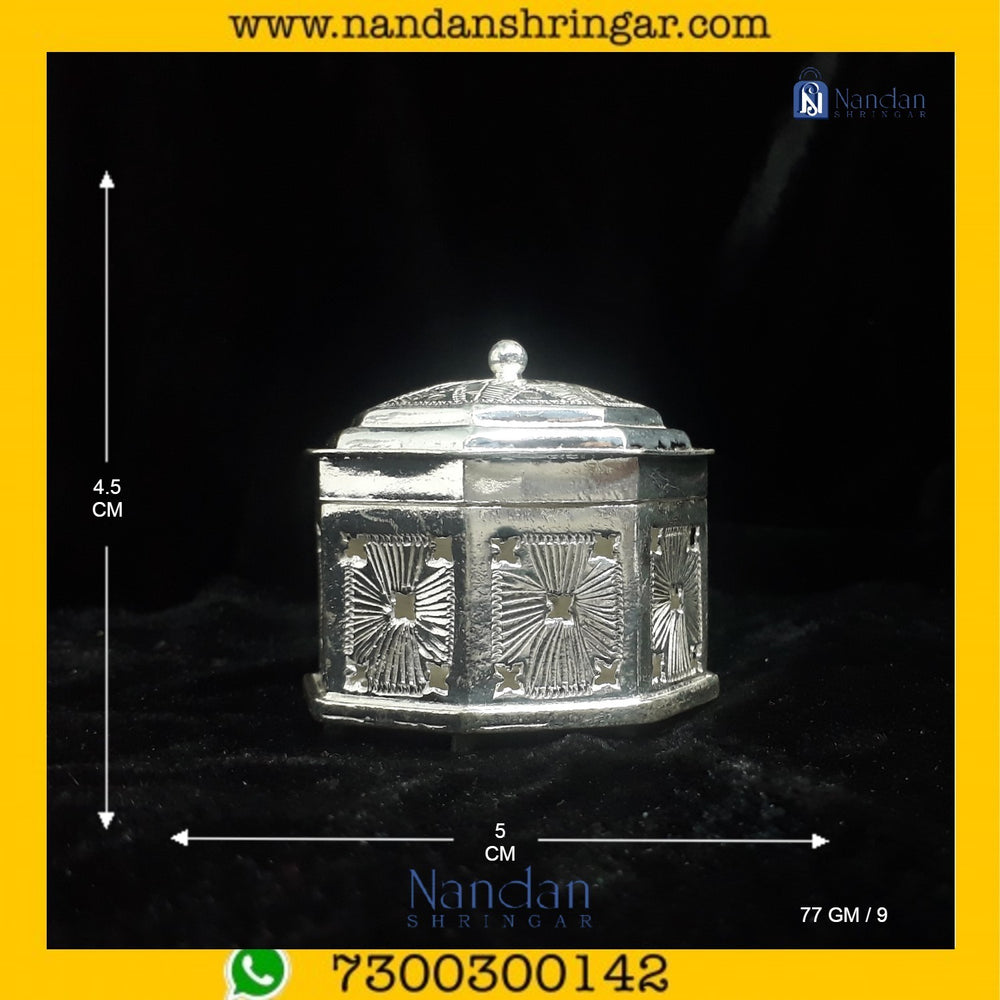Fine silver carving of Banta Ji by Utsav Arts, showcasing intricate details and craftsmanship in a decorative design.