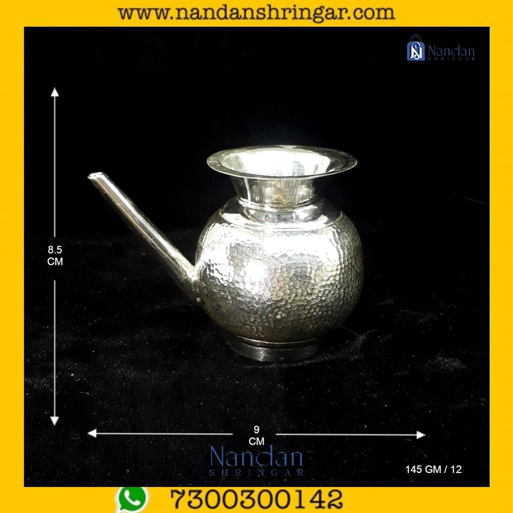Fine silver jewelry from Utsav Arts featuring intricate designs and a polished finish, showcased against a neutral background.