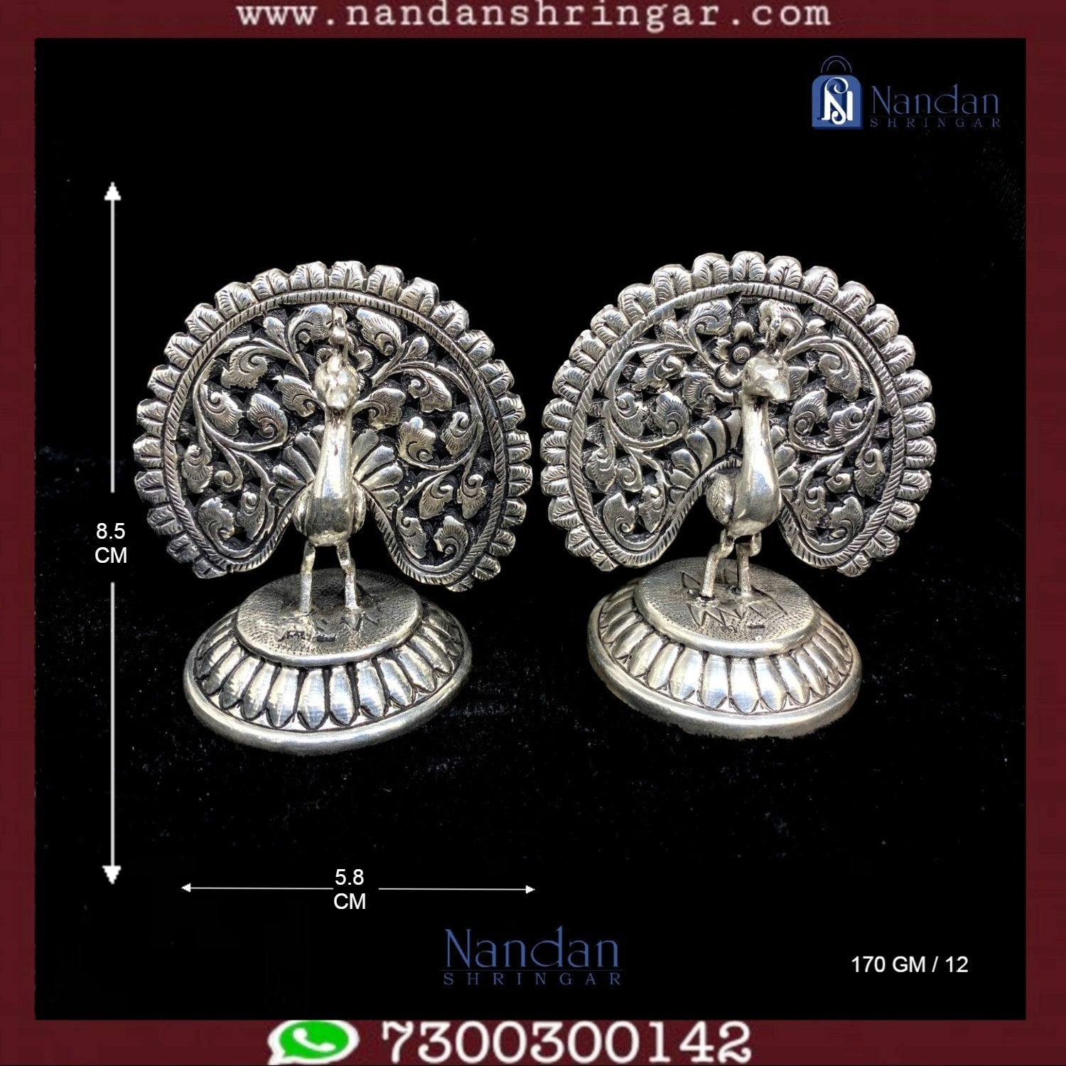 One pair of Utsav Arts peacock fine silver earrings showcasing intricate detailing and vibrant colors.