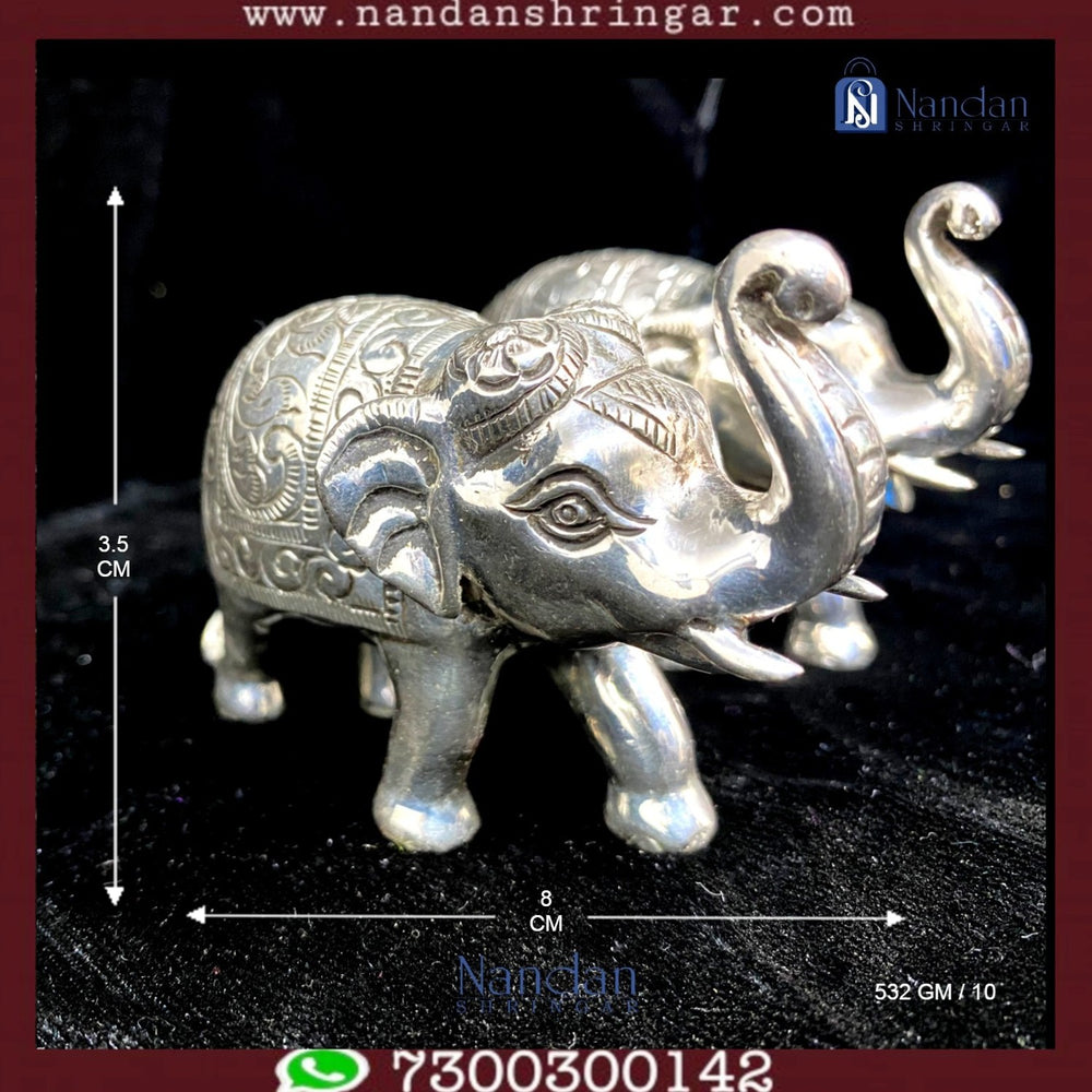 One pair of fine silver elephant figurines by Utsav Arts, showcasing intricate detailing and craftsmanship.