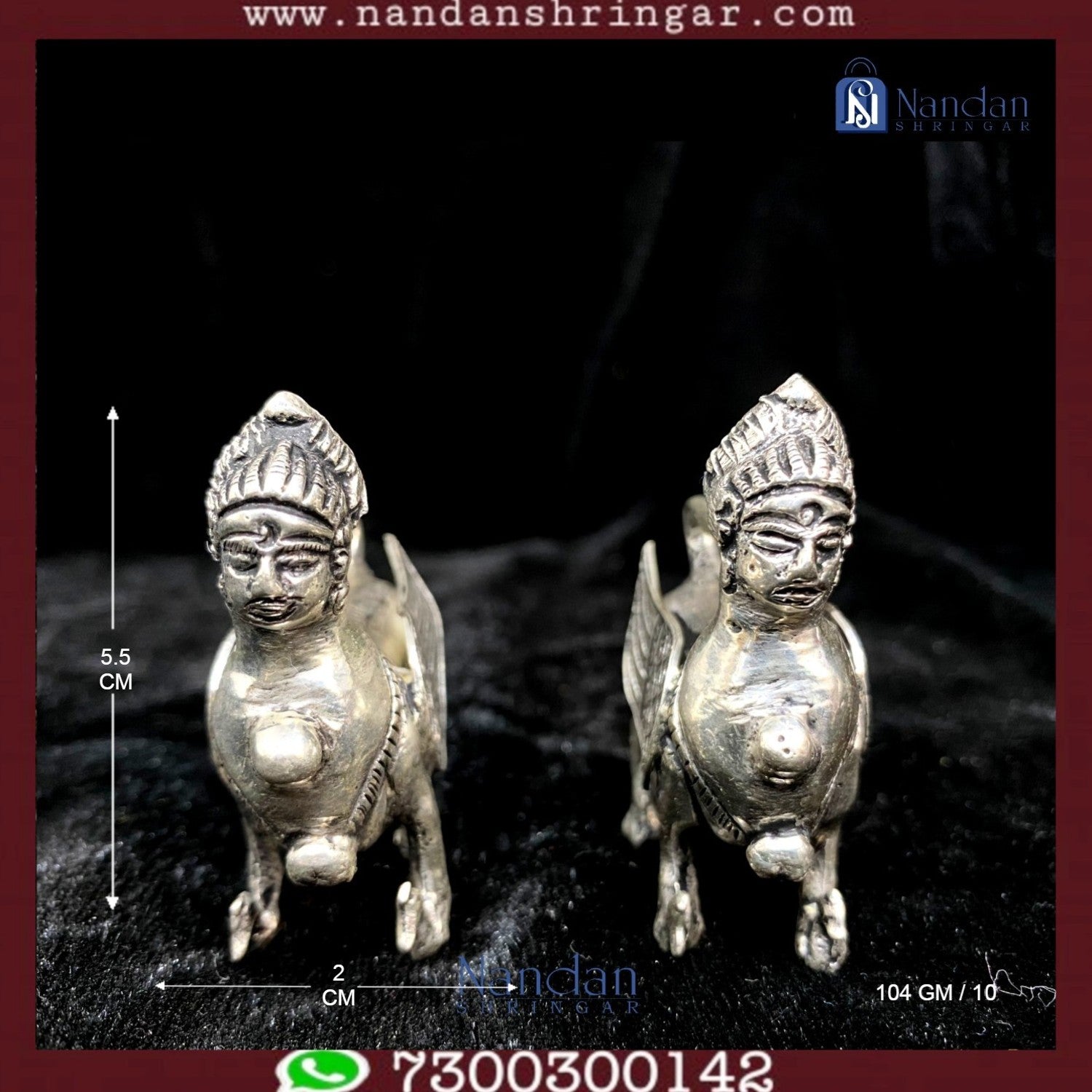 Fine silver pair of Kaamdhenu cows by Utsav Arts, showcasing intricate detailing and traditional craftsmanship.
