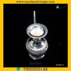 Fine silver jewelry by Utsav Arts featuring intricate designs and a polished finish, showcasing elegance and craftsmanship.