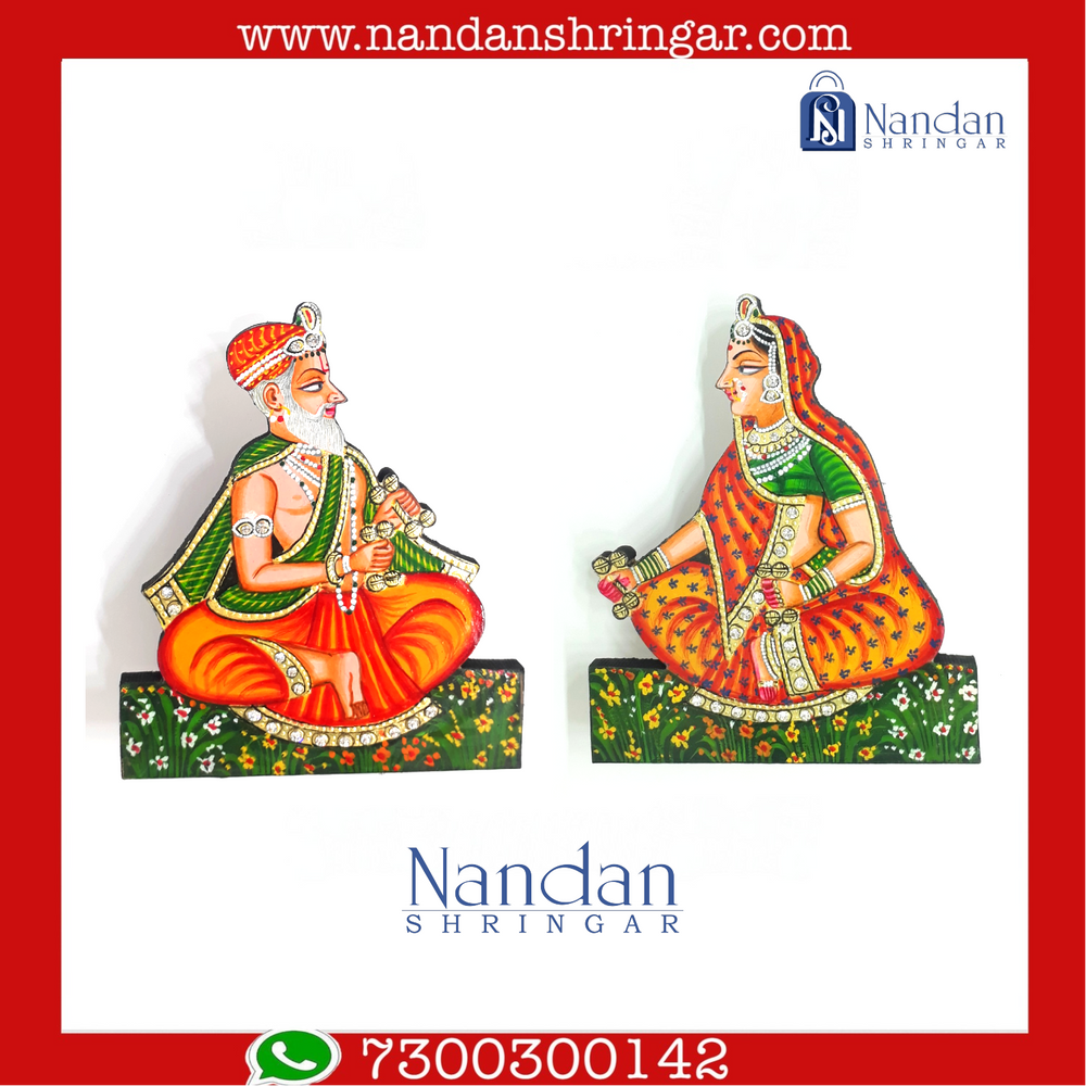 Hand-painted wooden Nand Yashoda pair depicting traditional Indian craftsmanship and vibrant colors.