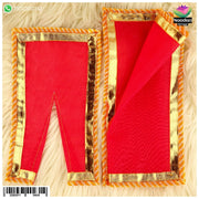 Red Mal Mal Chira Odhni from Nandanshringars displayed on a hanger, showcasing its vibrant color and traditional fabric texture.