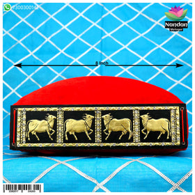 Black Cow Gaadi Mohra, 8-inch decorative hanging ornament from Nandanshringars featuring intricate design.