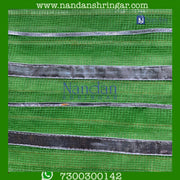 Green Dhora Wala Doriya Special Zari Vastra by nandanshringars, showcasing intricate zari work and vibrant color.