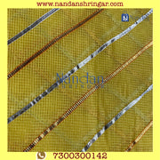 Yellow Dhora Wala Doriya Special Zari Vastra by nandanshringars, showcasing intricate zari details and vibrant color.